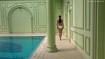 Hottest Russian pornstar Irina strips nude in swimming pool